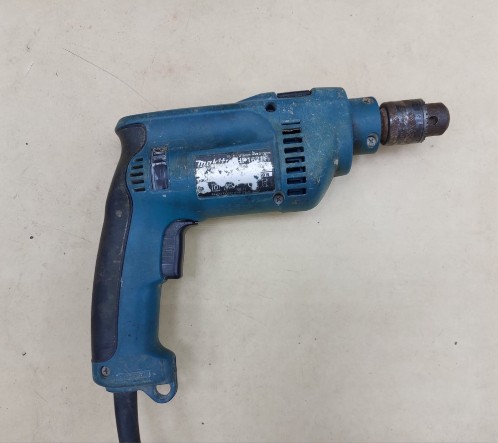 Дрель ударная Makita HP 1621 F