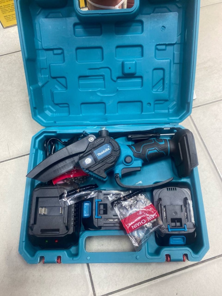 Цепная электропила Makita
