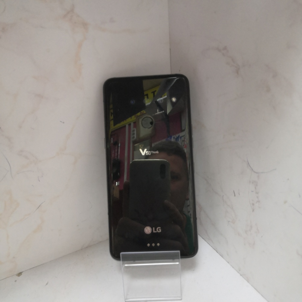 Мобильный телефон LG v50
